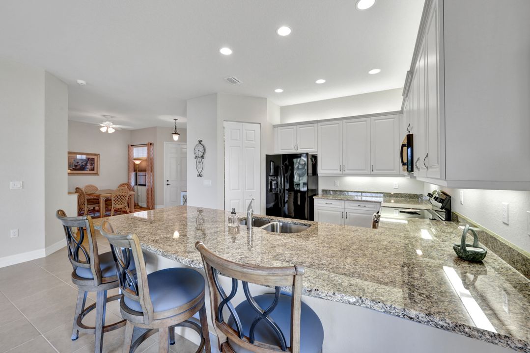 13466 Sumter Ln, Naples, FL 34109
