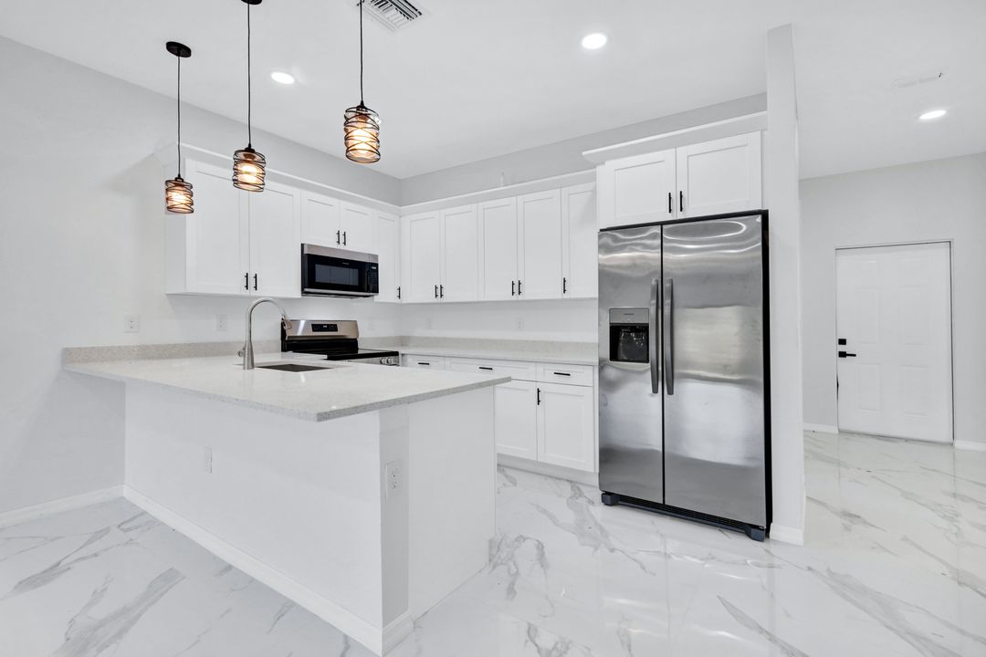 1237 Hillcrest St E, Lehigh Acres, FL 33974