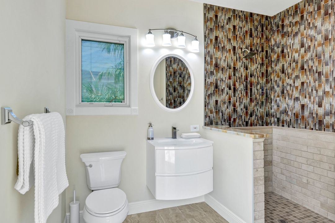 13488 Pond Apple Dr W, Naples, FL 34119