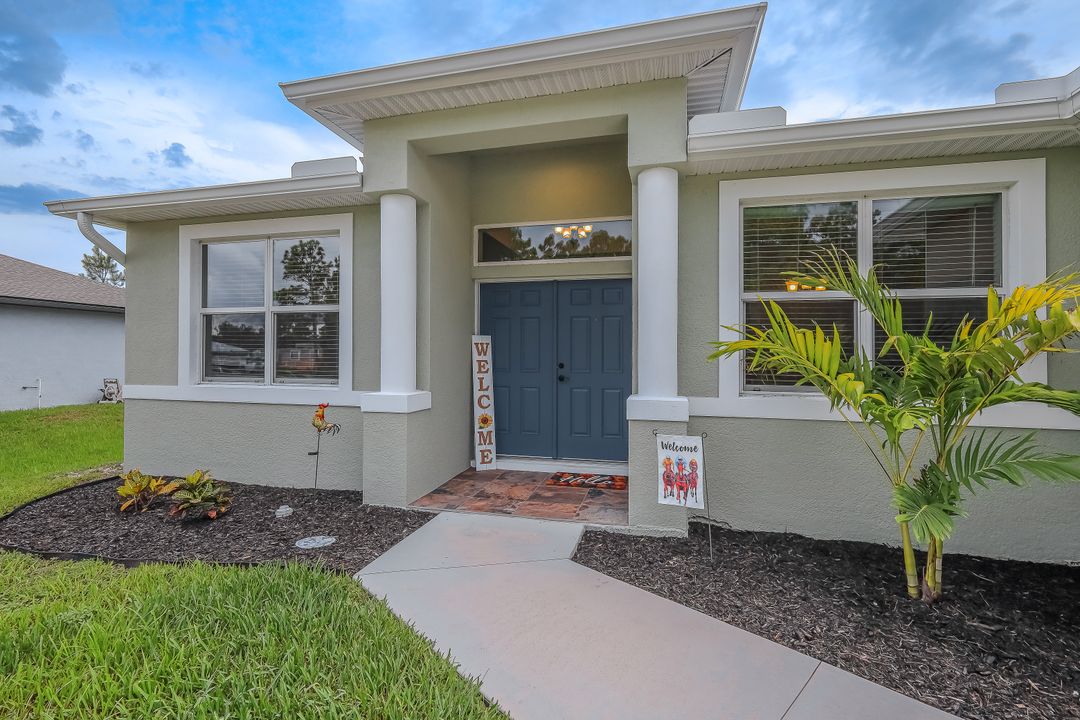 670 Nimitz Blvd, Lehigh Acres, FL 33974