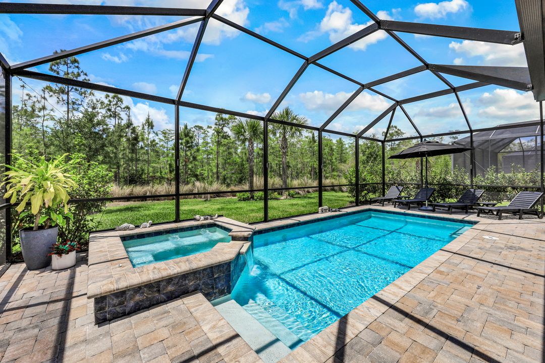 7692 Winding Cypress Dr, Naples, FL 34114