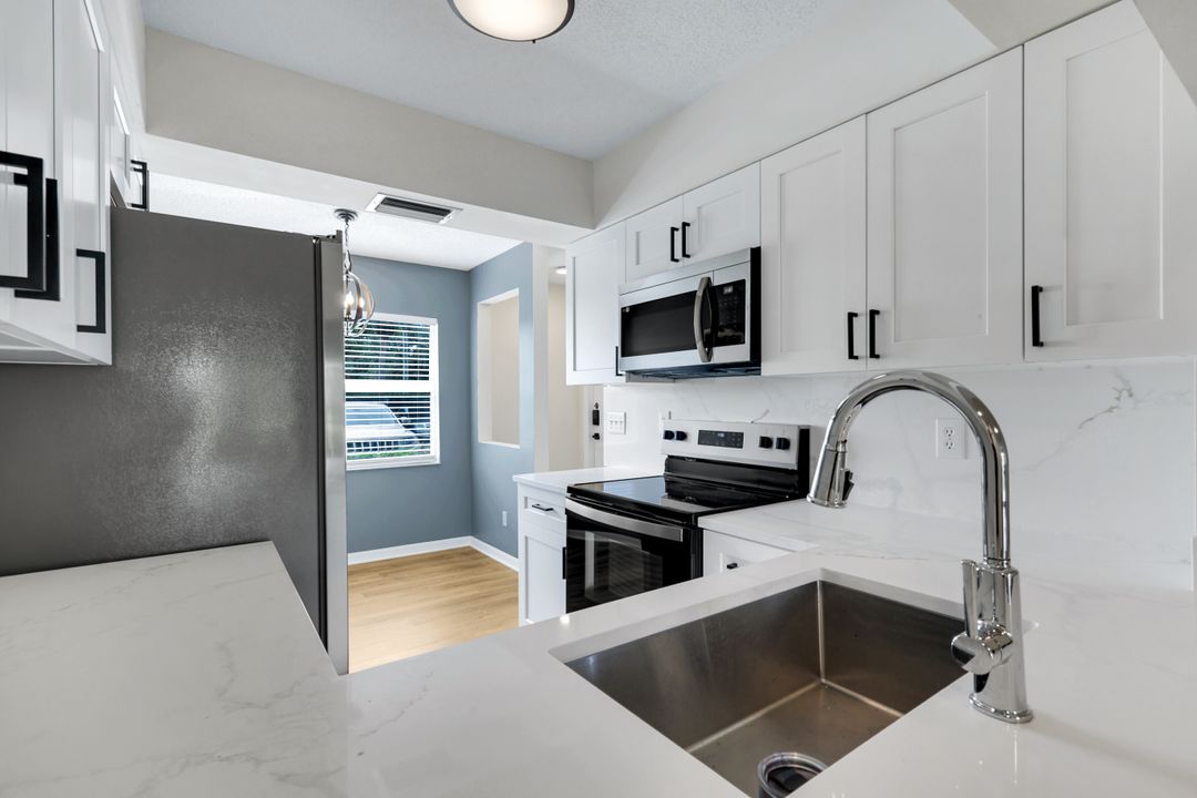 121 Wading Bird Cir #B-103, Naples, FL 34110
