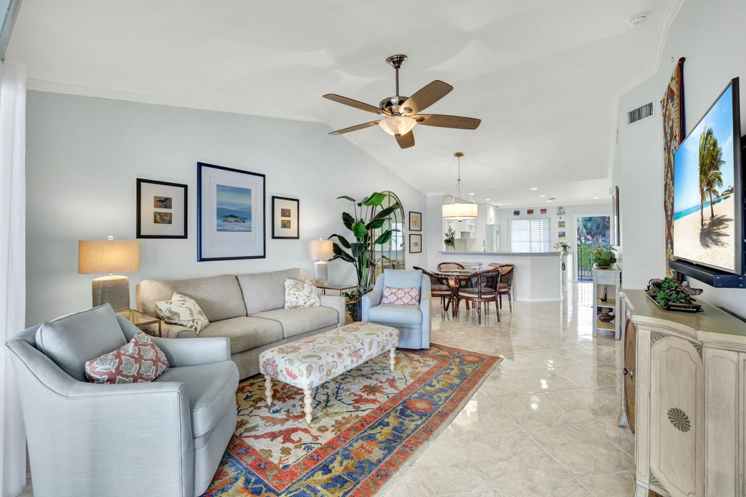 7742 Emerald Cir #V203, Naples, FL 34109