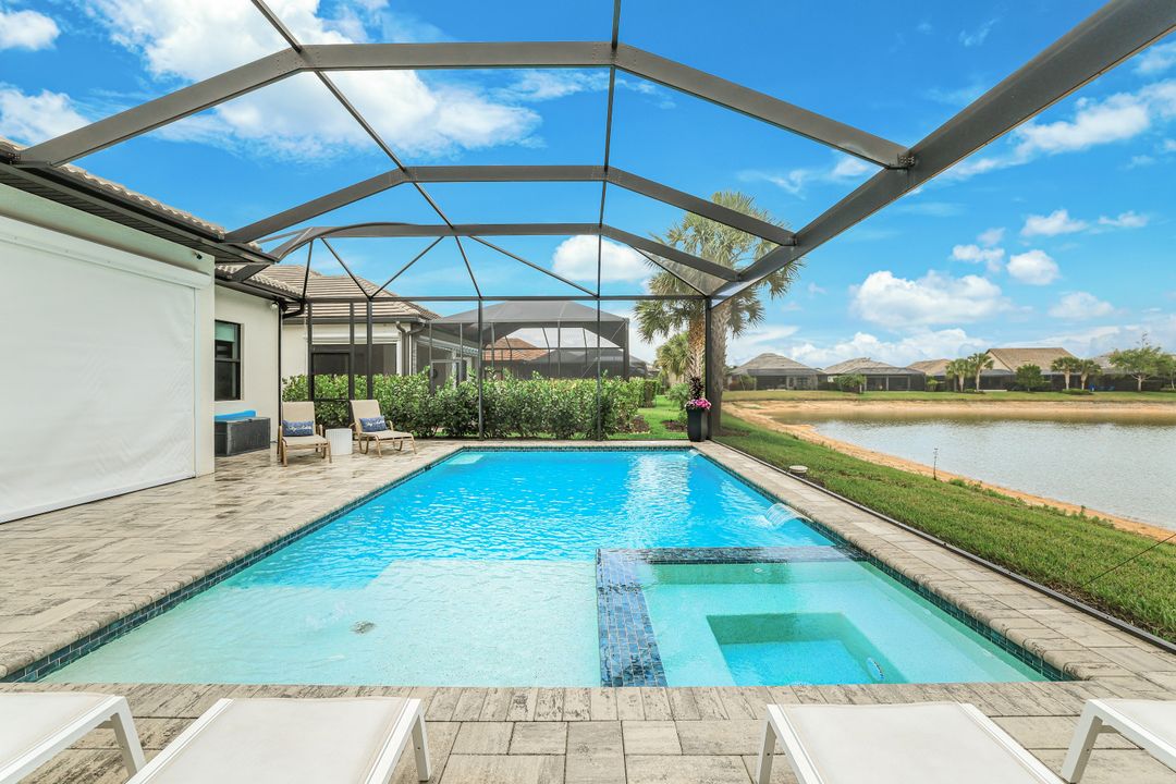 7631 Winding Cypress Dr, Naples, FL 34114