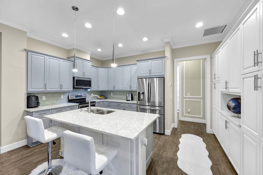 6927 Cay Ct, Naples, FL 34113
