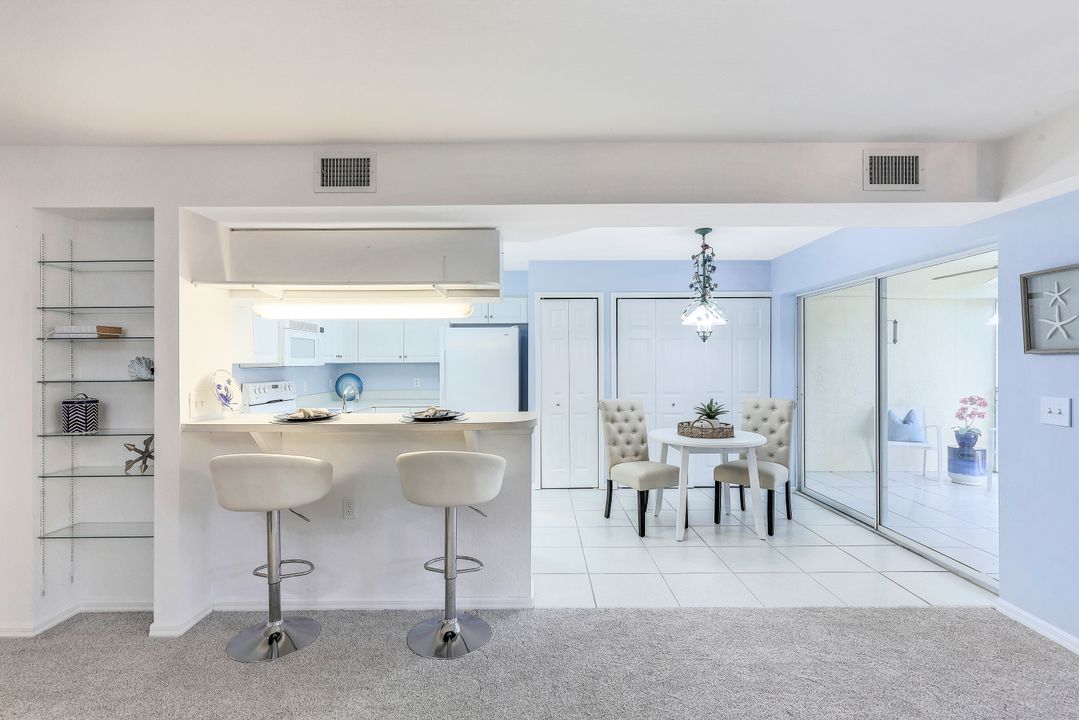 15465 Cedarwood Ln #7-202, Naples, FL 34110