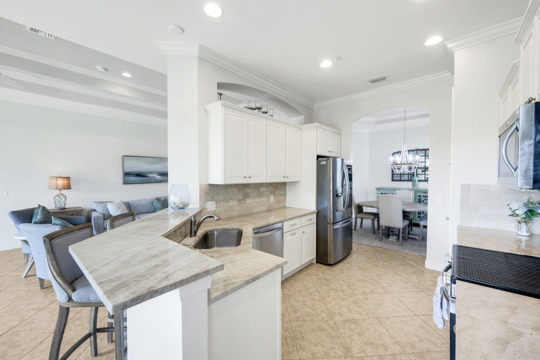 9550 Ironstone Terrace #201, Naples, FL 34120