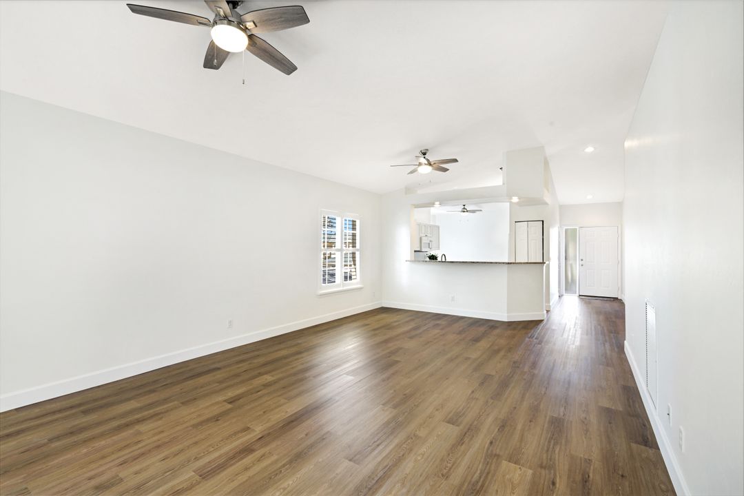 675 Wiggins Lake Dr #202, Naples, FL 34110