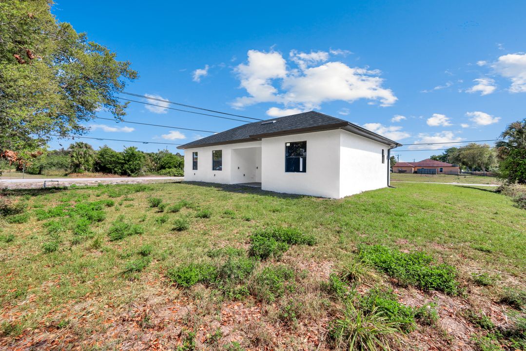 100 Parish Dr, Lehigh Acres, FL 33974