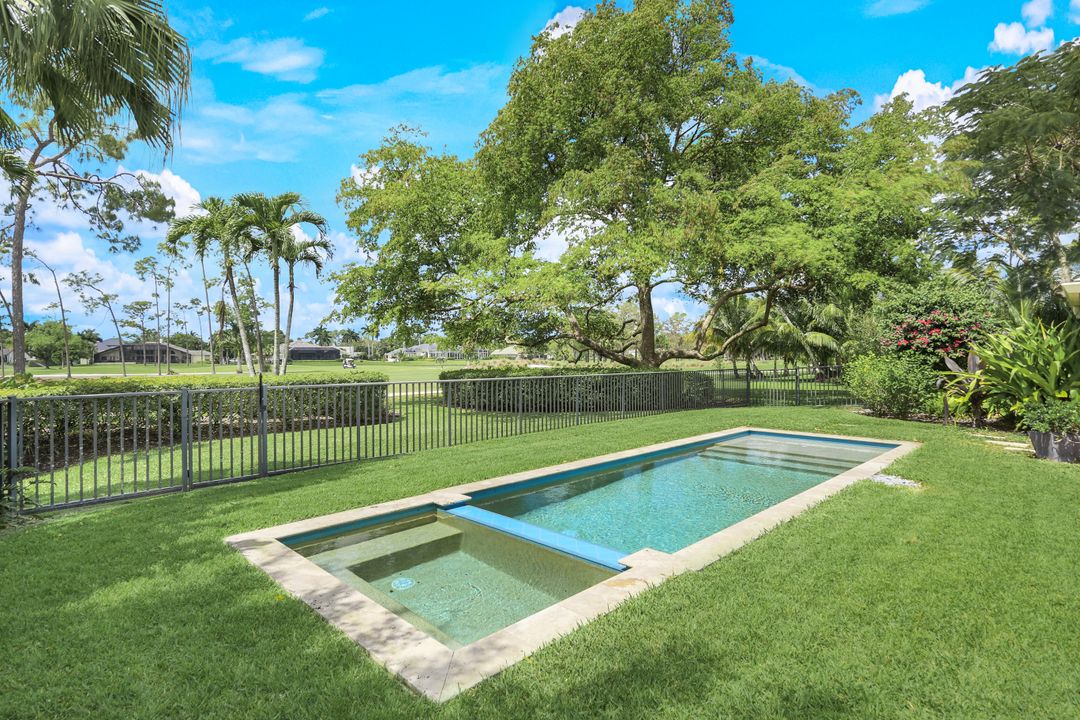 12975 Bald Cypress Ln, Naples, FL 34119