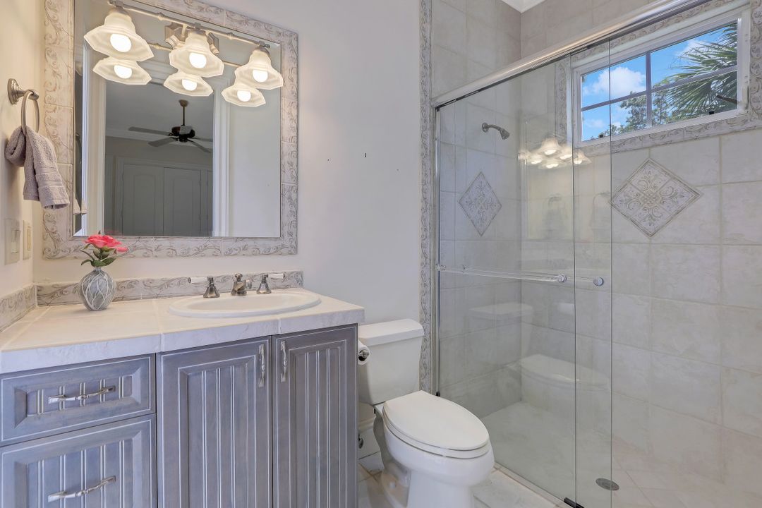 999 Barcarmil Way, Naples, FL 34110