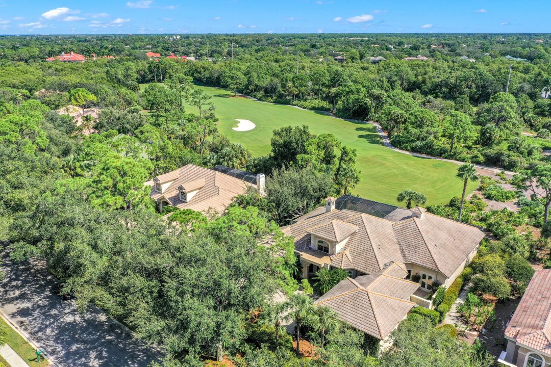 999 Barcarmil Way, Naples, FL 34110