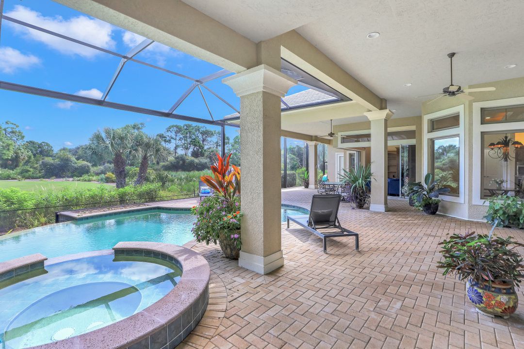 999 Barcarmil Way, Naples, FL 34110