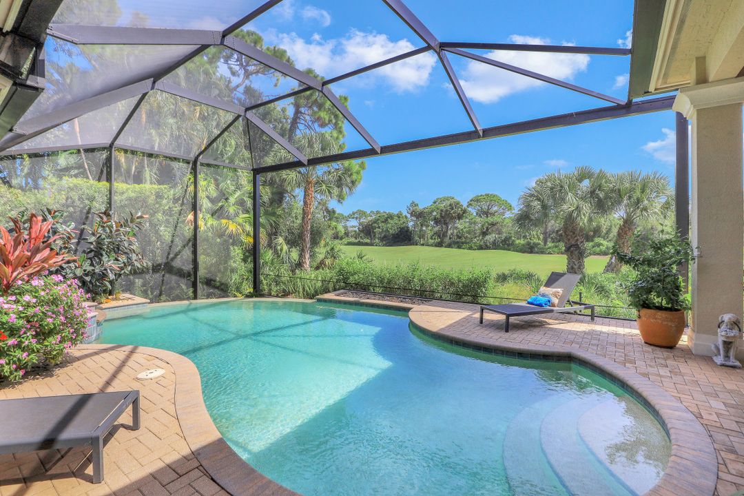 999 Barcarmil Way, Naples, FL 34110