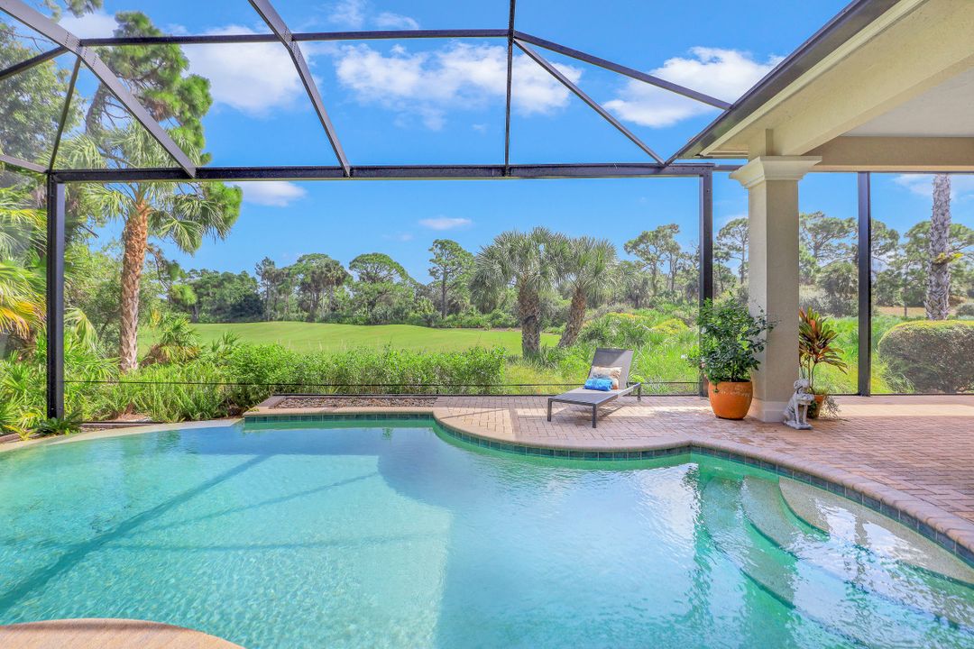 999 Barcarmil Way, Naples, FL 34110