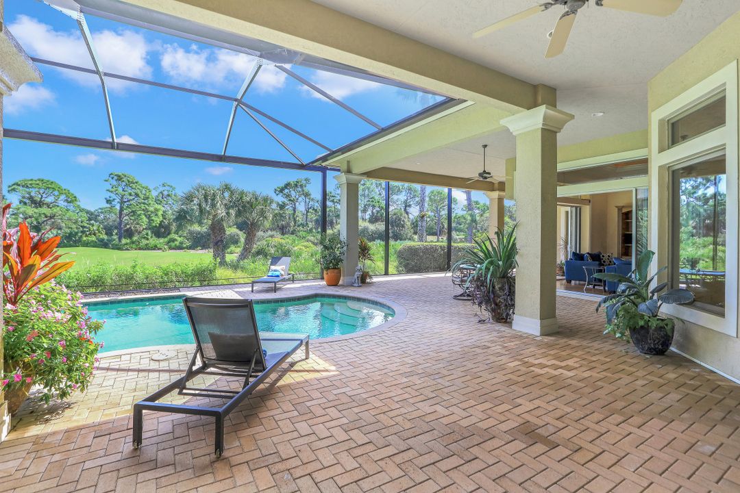 999 Barcarmil Way, Naples, FL 34110