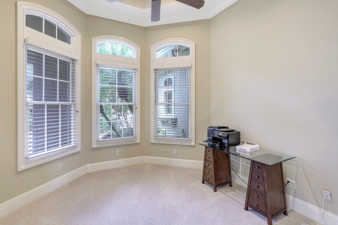 999 Barcarmil Way, Naples, FL 34110