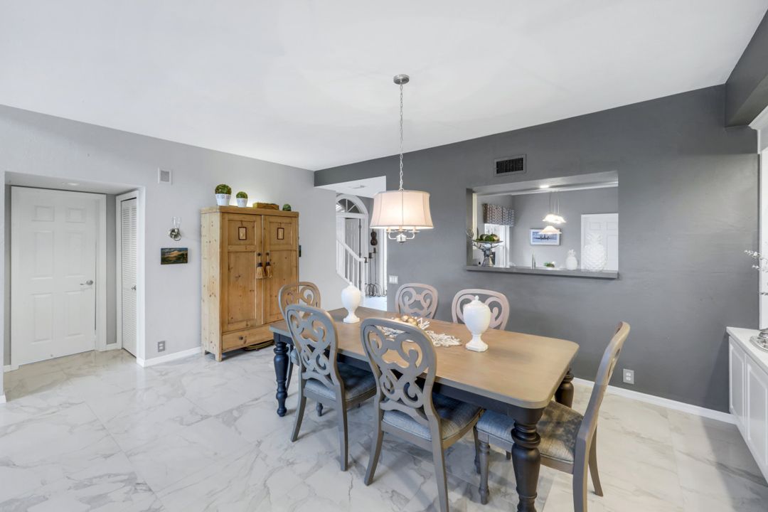 11626 Quail Village Way, Naples, FL 34119
