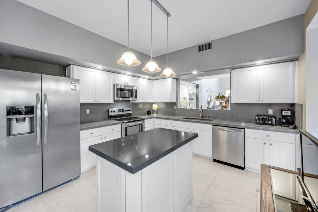 11626 Quail Village Way, Naples, FL 34119