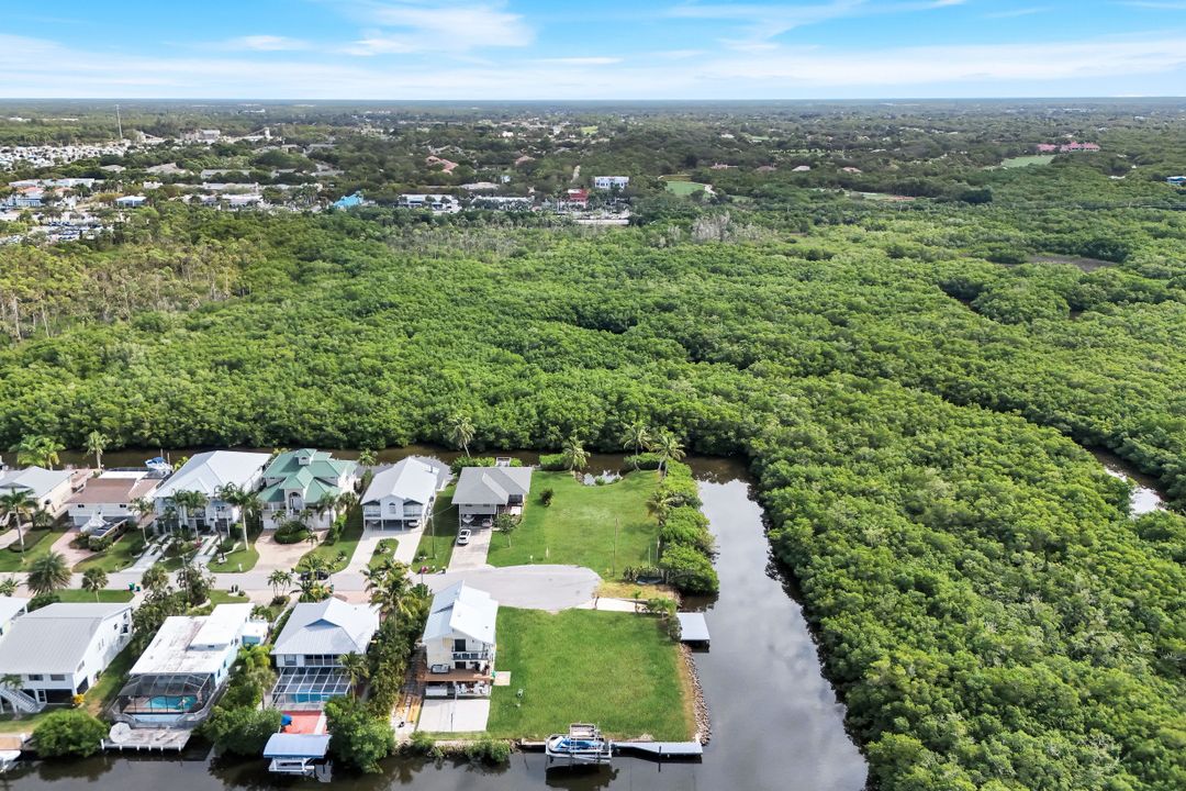 1277 Grand Canal Dr, Naples, FL 34110