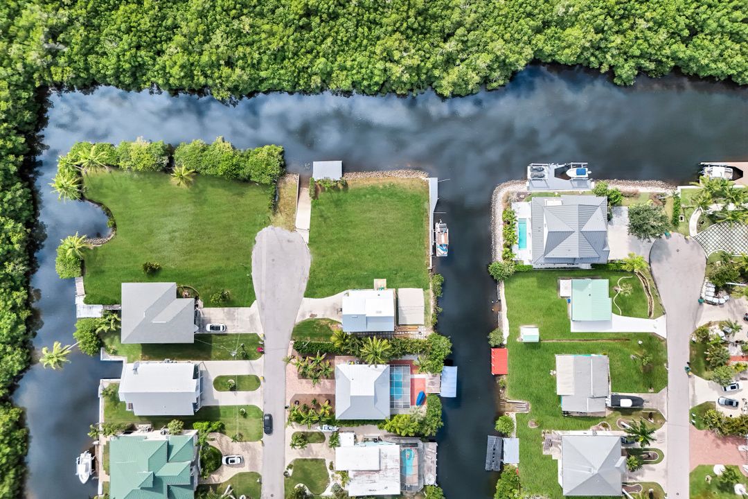 1277 Grand Canal Dr, Naples, FL 34110