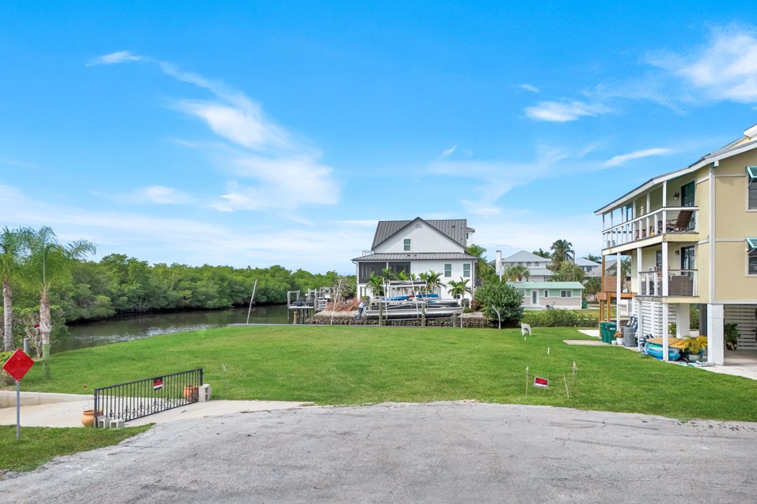 1277 Grand Canal Dr, Naples, FL 34110