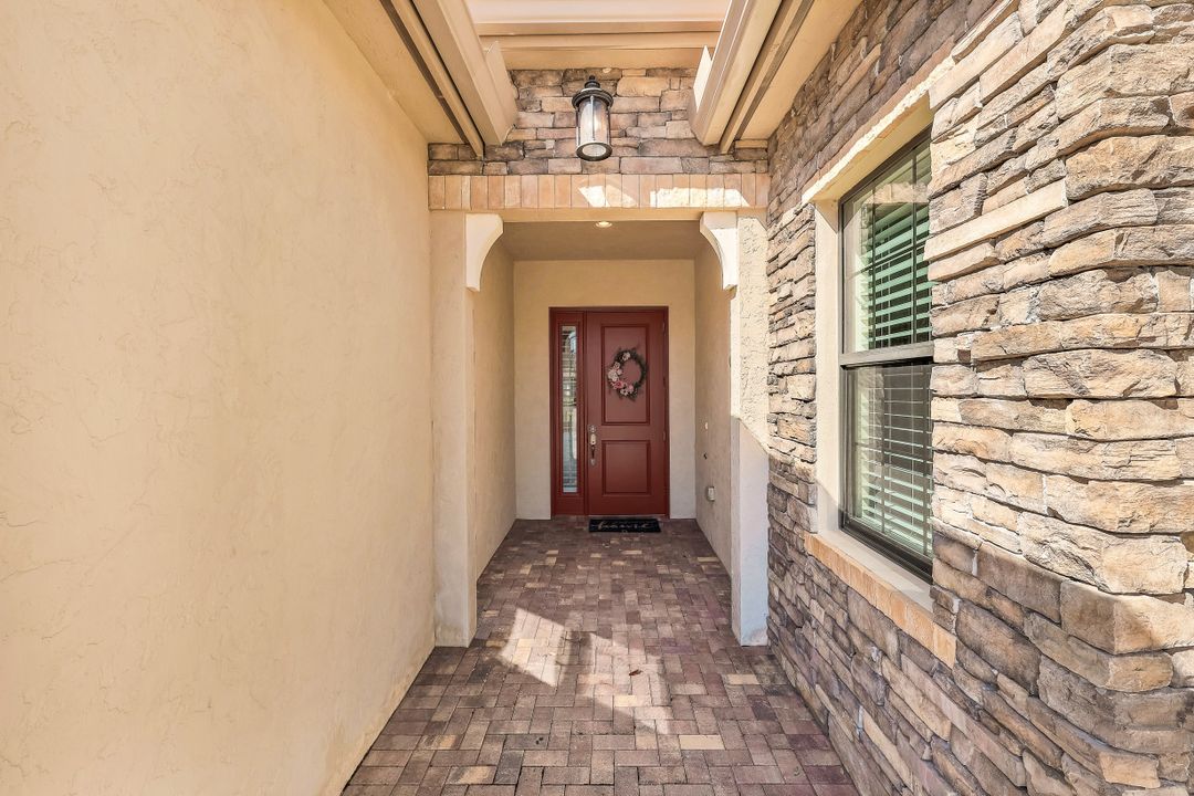 9469 Greenleigh Ct, Naples, FL 34120