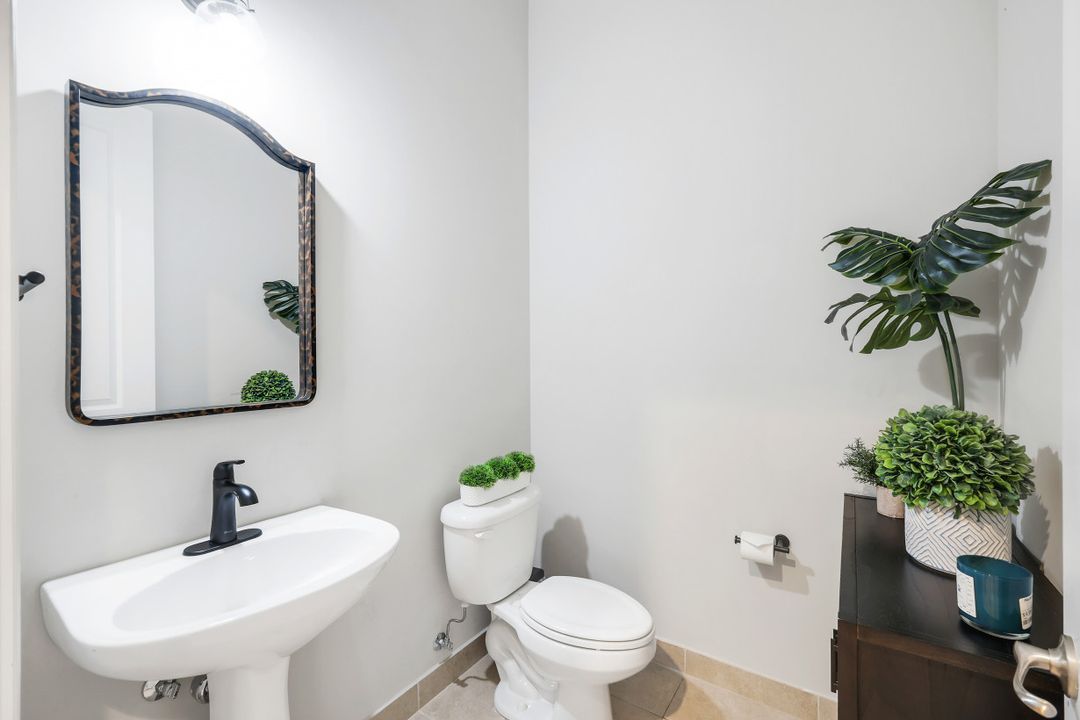 9469 Greenleigh Ct, Naples, FL 34120