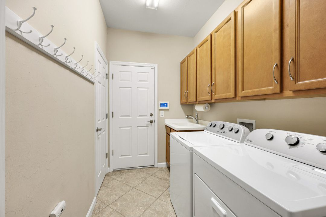7098 Live Oak Dr, Naples, FL 34114