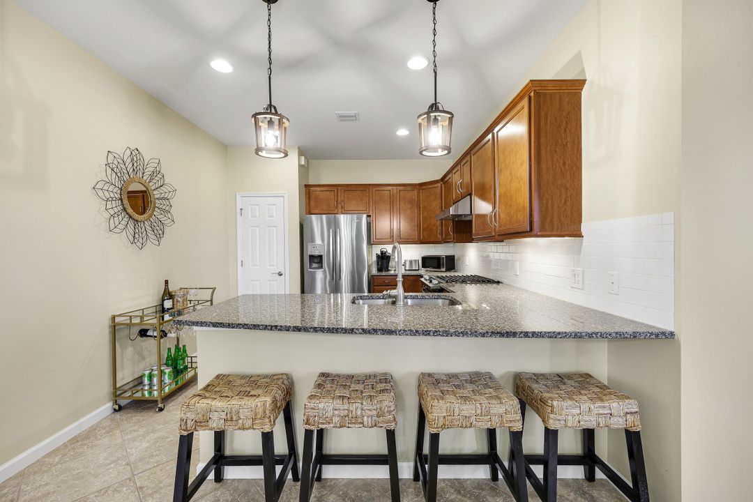 7098 Live Oak Dr, Naples, FL 34114