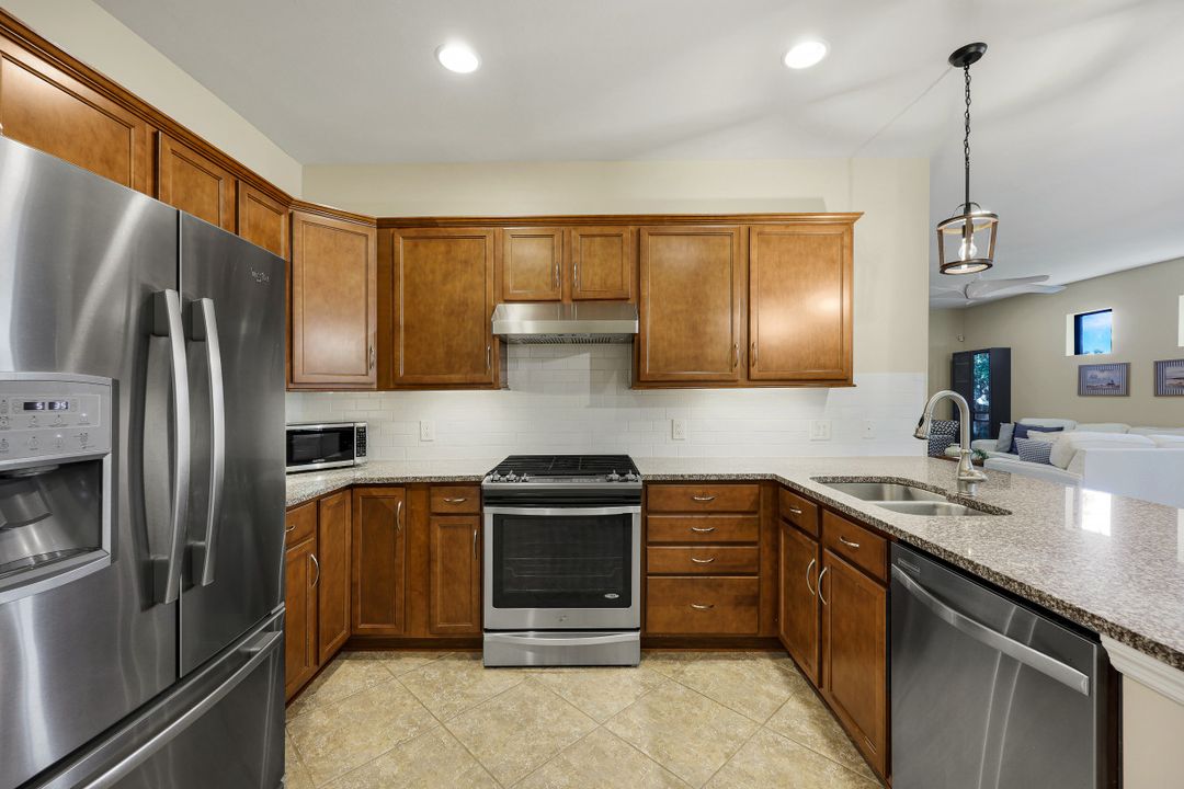 7098 Live Oak Dr, Naples, FL 34114
