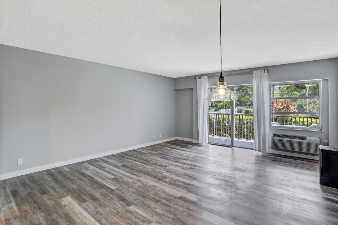 1 Bluebill Ave #104, Naples, FL 34108