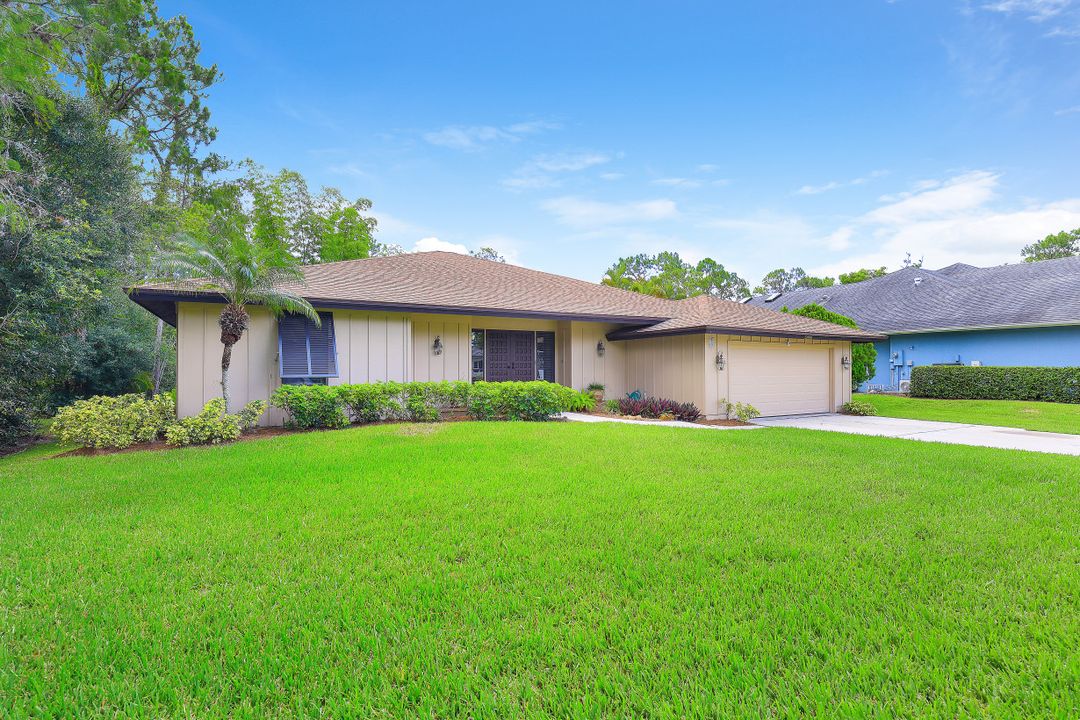 5890 Cypress Hollow Way, Naples, FL 34109